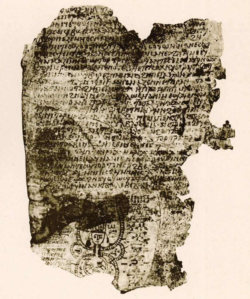 A damaged Coptic parchment, with an image at the bottom of a figure with striated, tube-like appendages, surrounded by characters (magical signs).