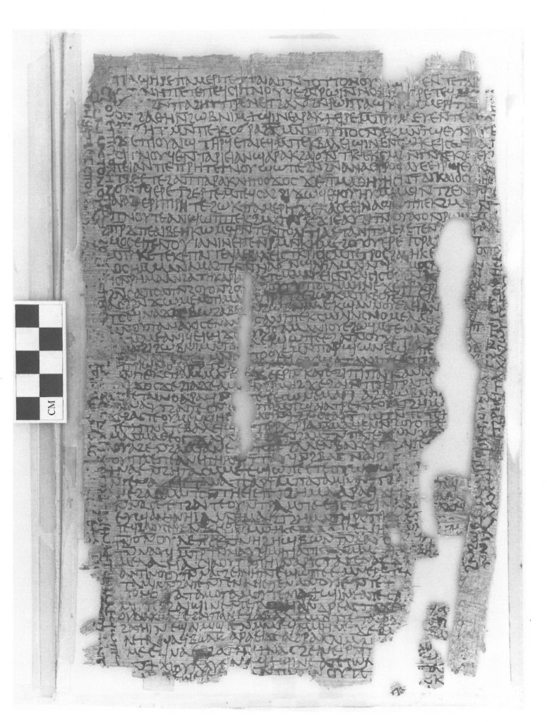 Black and white image of a fragmentary papyrus, with text written in Coptic.