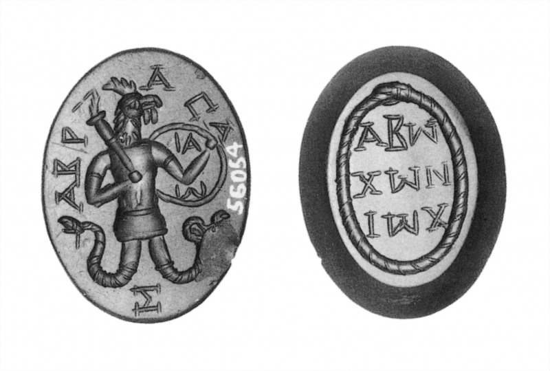 Black and white image of an oval gem, with a rooster-headed man with snake-legs holding a club or torch and shield on one side, surrounded by Greek writing. On the other side, a snake swallowing its own tail surrounds three more lines of Greek text.
