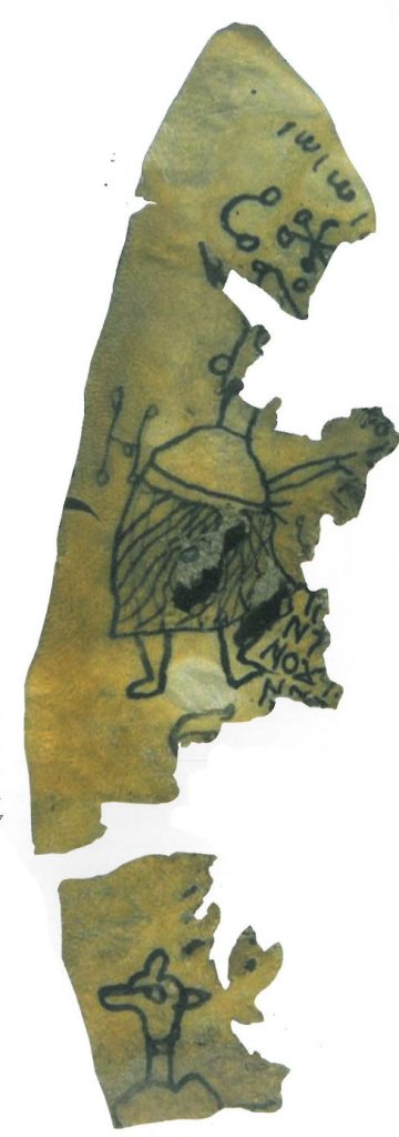 Fragments of a triangular shaped parchement text. Two fragmentary humanoid figures can be seen, one with what looks like the head of a dog, as well as some magical symbols and Coptic text.