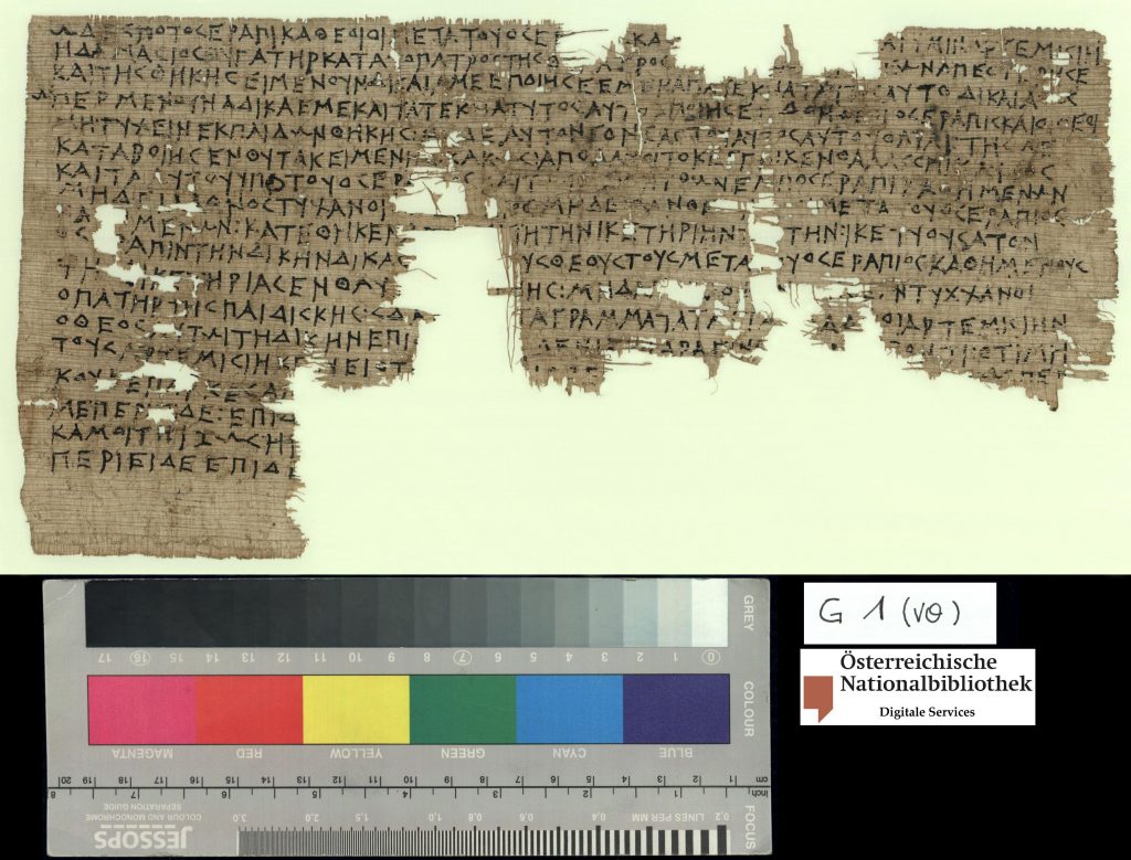 An image of a damaged papyrus, written in large Greek letters.