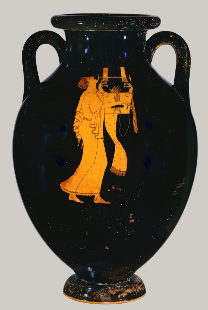 This work is a masterpiece of Greek vase-painting because it brings together many features of Athenian culture in an artistic expression of the highest quality. The shape itself is central to the effect. Through the symmetry, scale, and luminously glossy glaze on the obverse, it offers a carefully composed three-dimensional surface that endows the subject with volume. The identity of the singer is given by his instrument, the kithara, which was a type of lyre used in public performances, including recitations of epic poetry. The figure on the reverse is identified by his garb and wand. While the situation is probably a competition, the subject is the music itself. It transports the performer, determines his pose, and causes the cloth below the instrument to sway gently.

Description from https://www.metmuseum.org/toah/works-of-art/56.171.38/